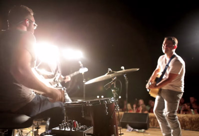 Cole-taylor-mid-30s-caucasian-male-plaing-gutsir-in-spotlight