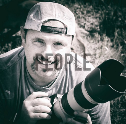 Franklin-ford-mid-40s-male-holding-up-camera-with-text-people