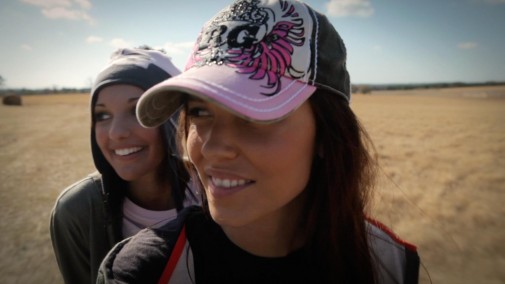 mid-30-caucasian-female-smiling-left-with-mid-20s-caucasian-female-behind-her-smiliing