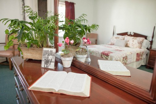 bedroom-counter-with-picture-of-couple-and-opened-book