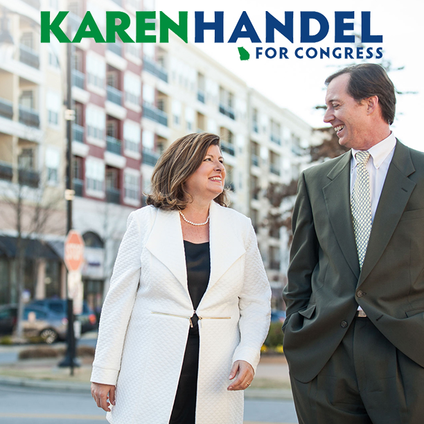 karen-handel-caucasian-woman-mid-50's-with-city-official-in-brookehaven-her-campaign-sign-at-top-of-screen