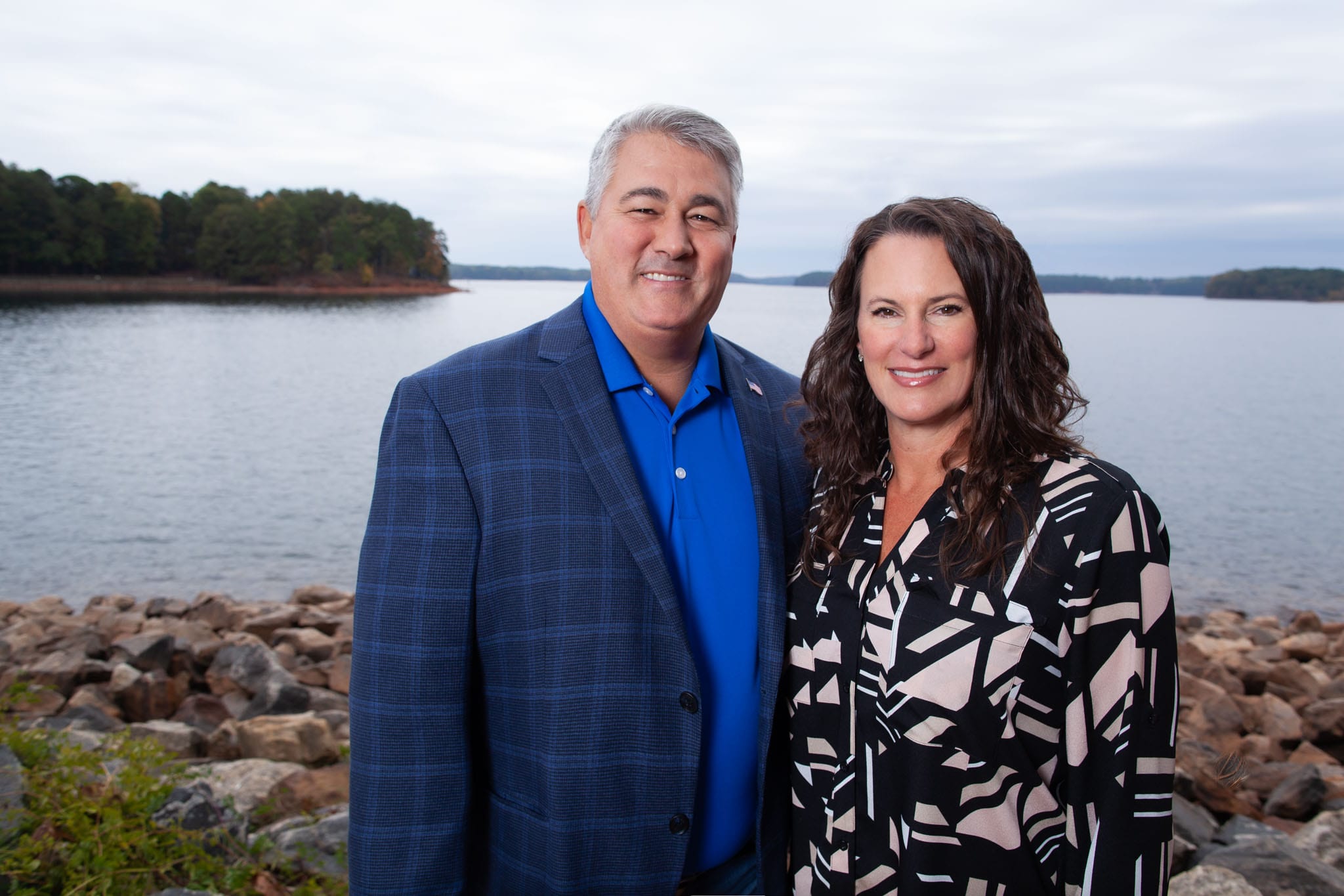 Lauren McDonald and wife, Claire, standing together at Lake Lanier.