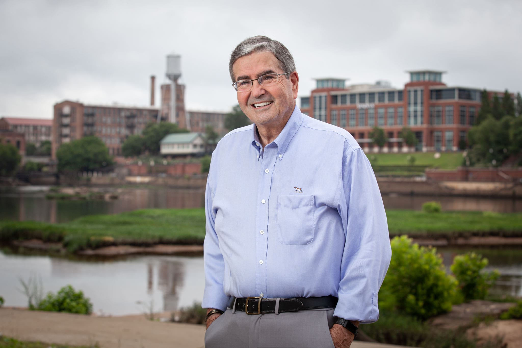 Georgia-Representative-Richard-Smith-smiling-with-the-buildings-and-water-tower-in-the-background-in-Columbus-Georgia