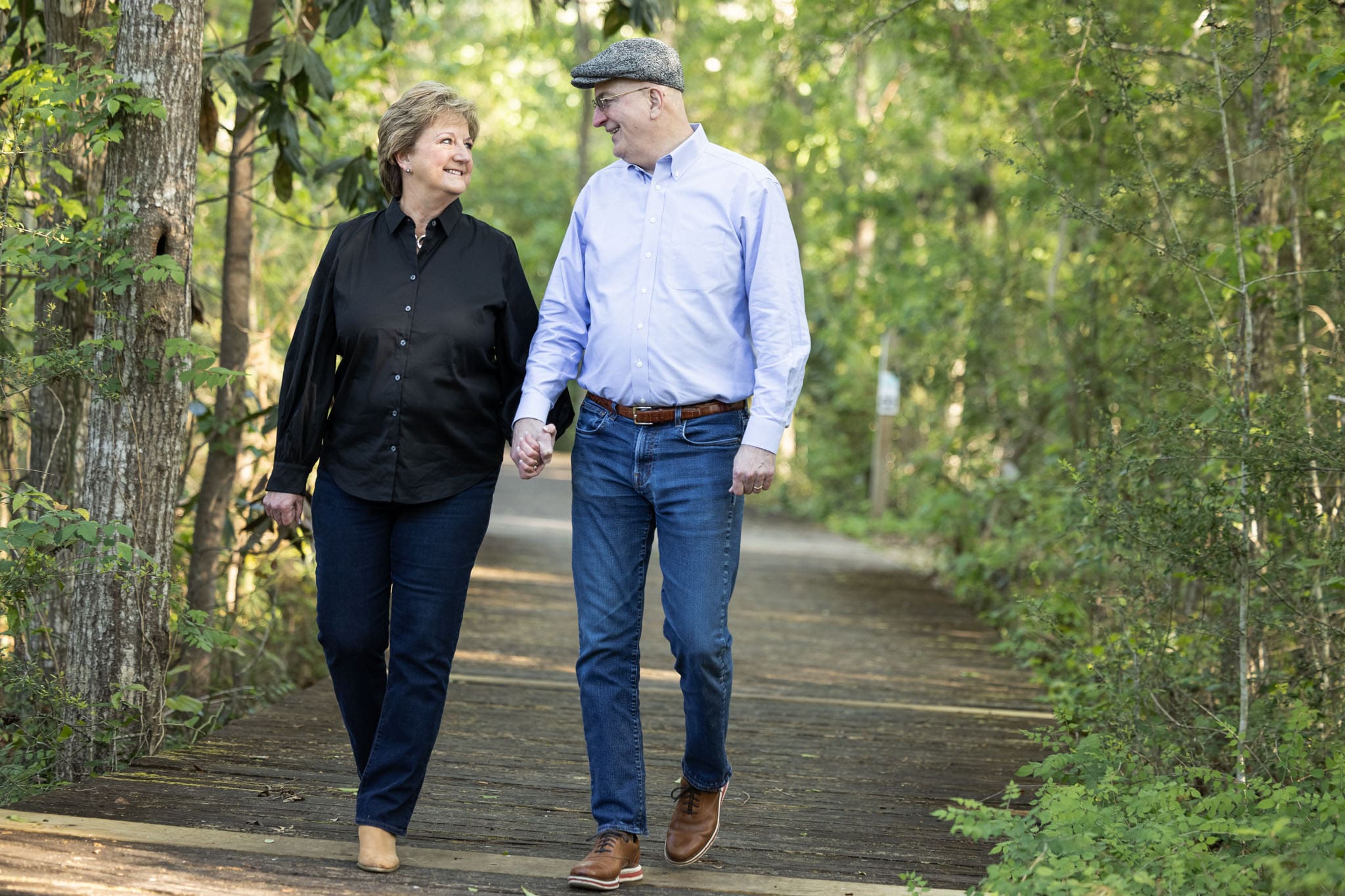sharon-hewitt-mid-sixties-caucasian-woman-with-mid-60-year-old-man-holding-hands-and-taking-stroll-in-park