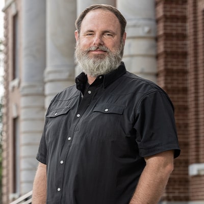 franklin-ford-caucasian-mid-40s-male-smiling-forward-in-front-of-courthouse